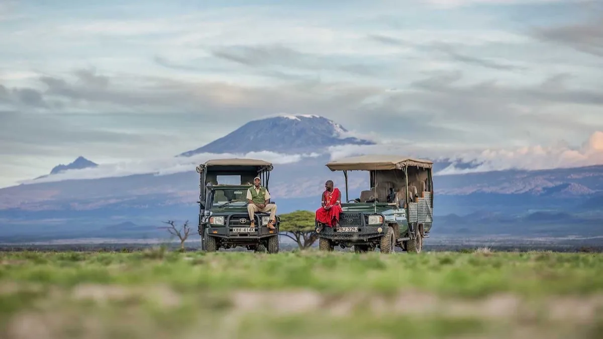 Tortilis Camp guides beneath Mount Kilimanjaro, Amboseli, Kenya