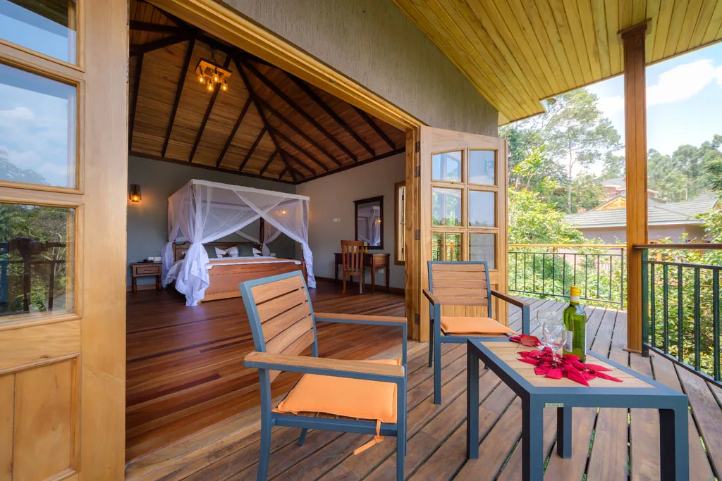 Cottage deck looking into the forest, Chimpundu Lodge, Kibale