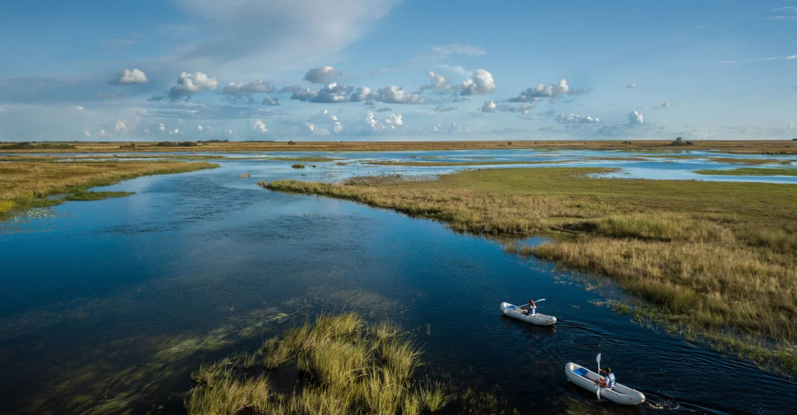 Canoes on the flooded Barotse plain, Liuwa Plain National Park, Zambia