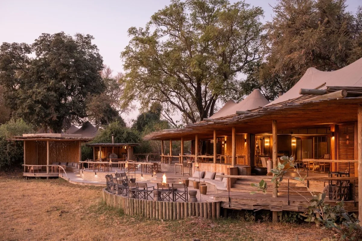 Main deck and firepit at Wilderness Mombo Camp, Okavango Delta