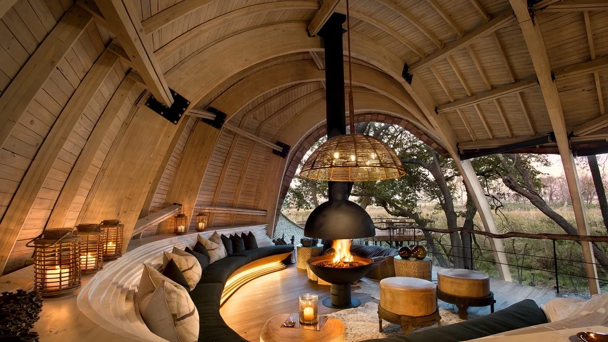 Fireside guest lounge at andBeyond Sandibe, Okavango Delta