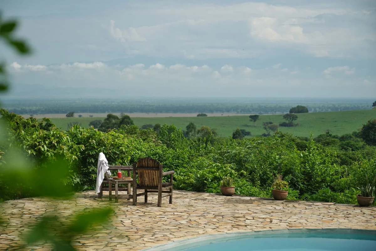 Pool terrace looking over the savannah, Kyambura Gorge Lodge, Uganda