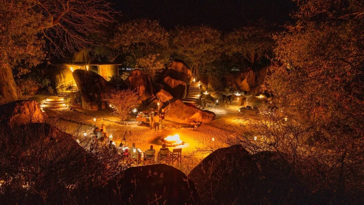 Firepit between the kopje boulders at night, Jabali Ridge, Ruaha