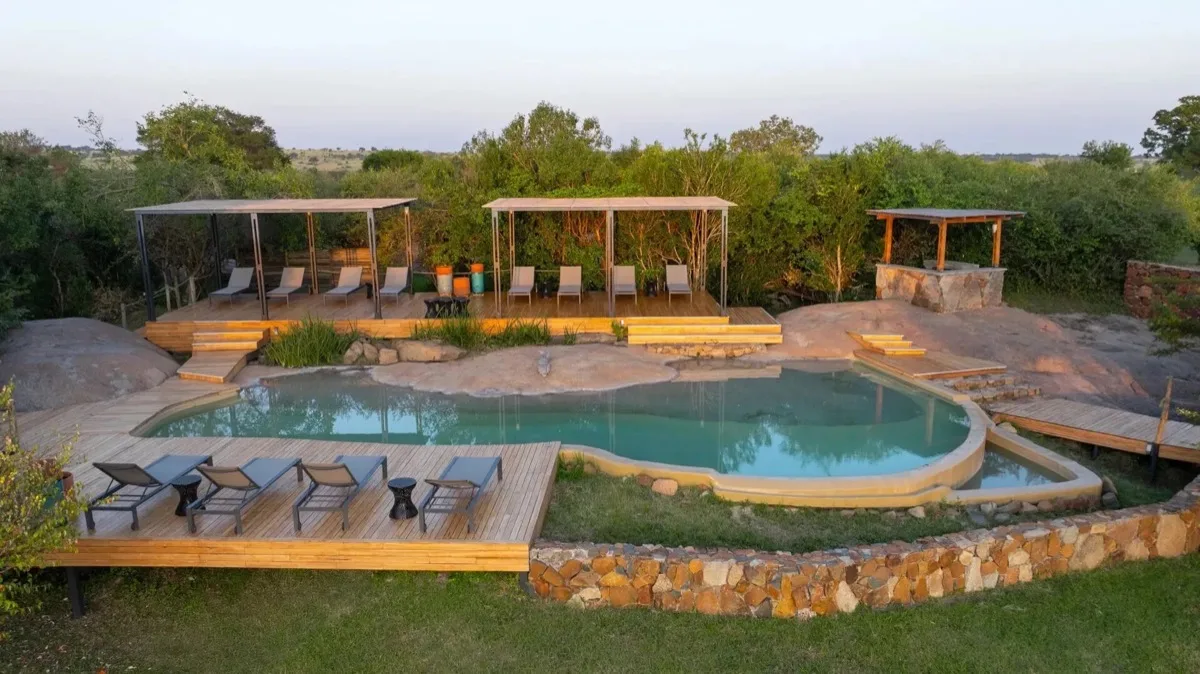 Pool carved between granite boulders at Sayari Camp, Serengeti