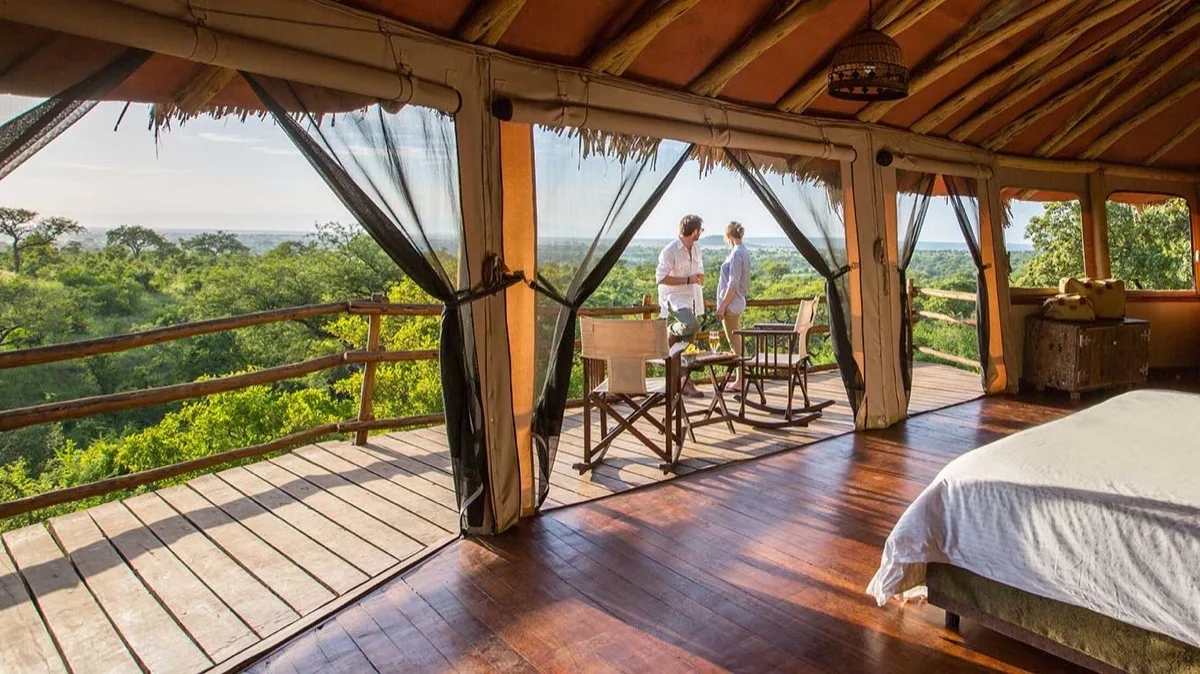 Treehouse suite interior with private deck, Tarangire Treetops