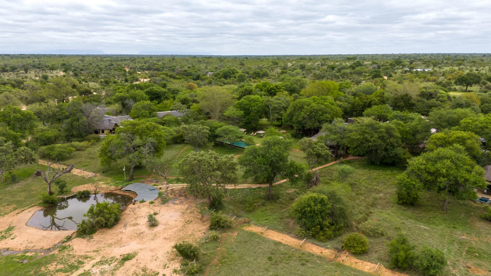 Kings Camp and its waterhole from the air, Timbavati Private Nature Reserve
