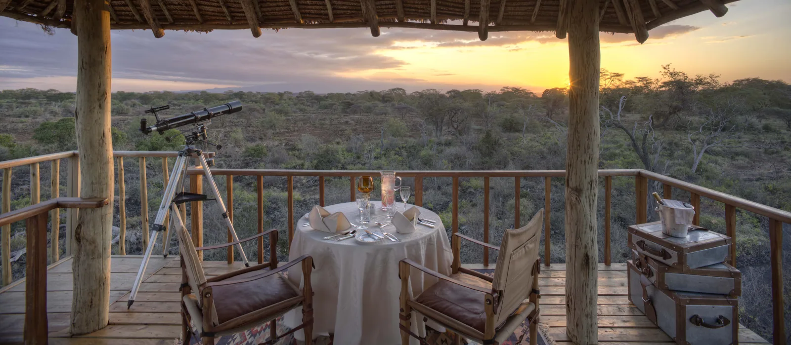 Telescope and sundowner table on the deck at Finch Hattons, Tsavo West