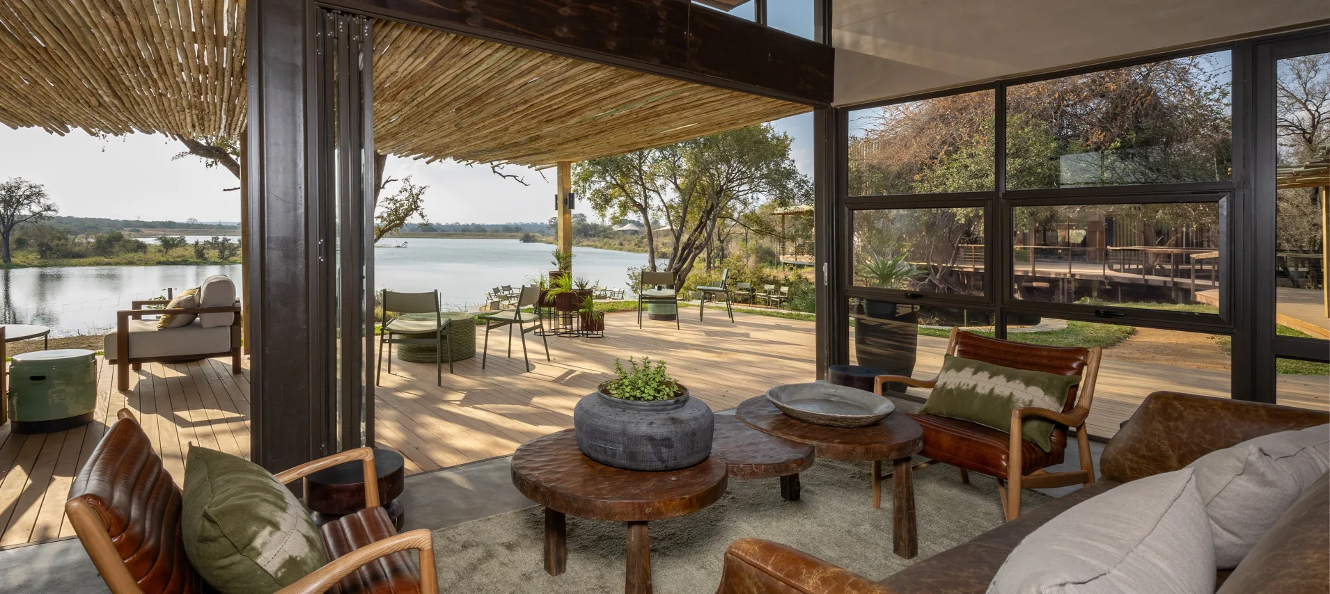 Main lodge deck and lounge overlooking the water at Sandringham Private Game Reserve, Greater Kruger