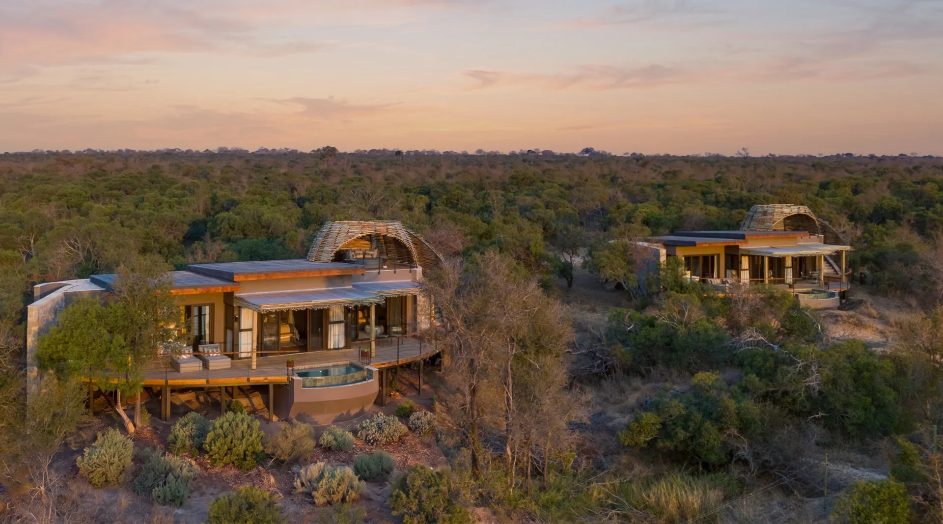 Shisaka Camp suites with nest-like rooftop salas at sunset, Sandringham Private Game Reserve, Limpopo